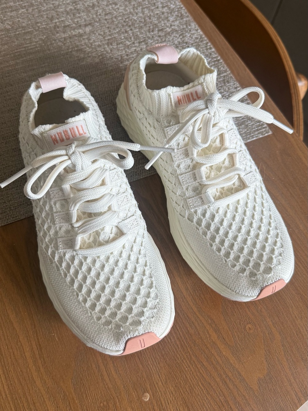 Women’s NOBULL knit runners in Cream with Pink Accents